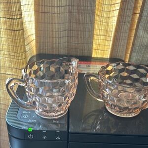 Pink depression, glass sugar, and creamer
